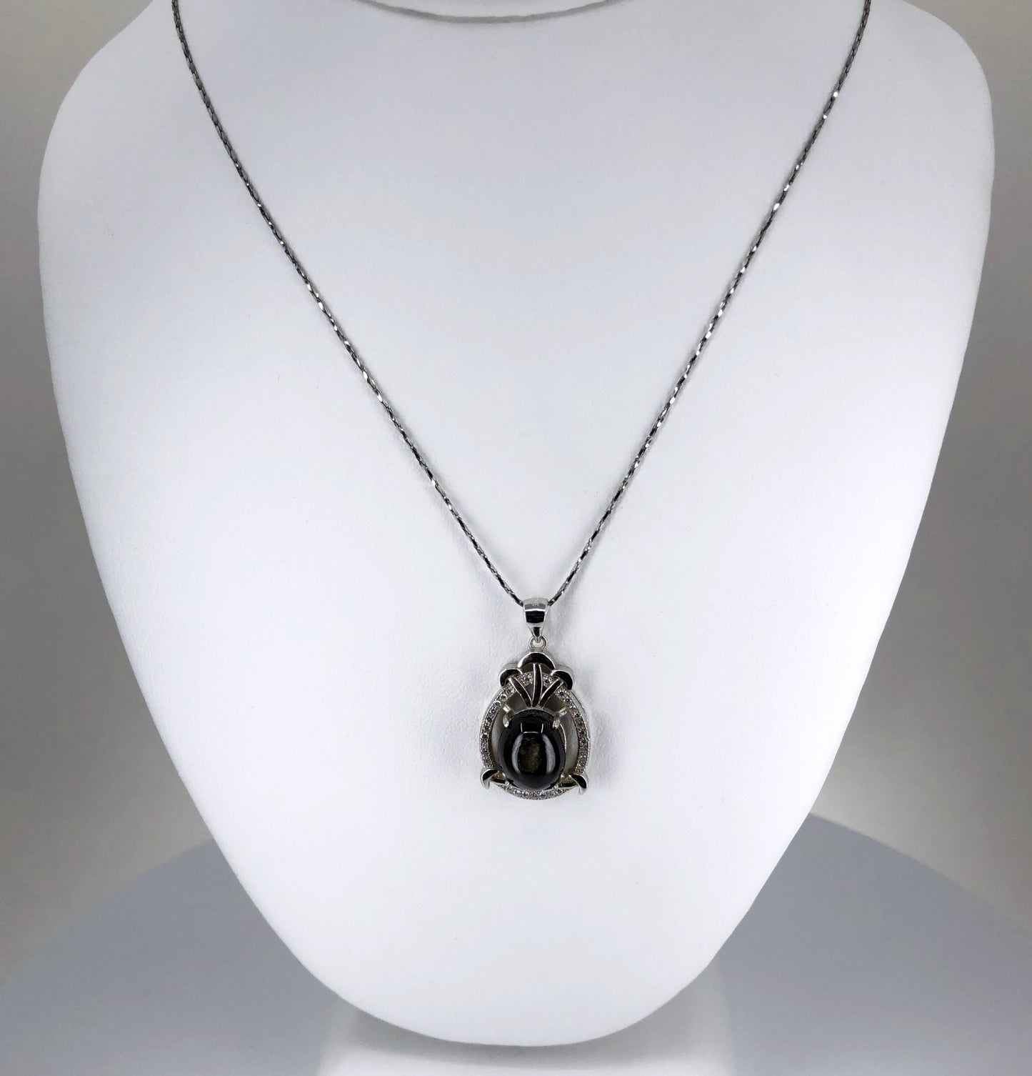 black star sapphire pendant necklace with a cubic zirconia halo with a 20" chain