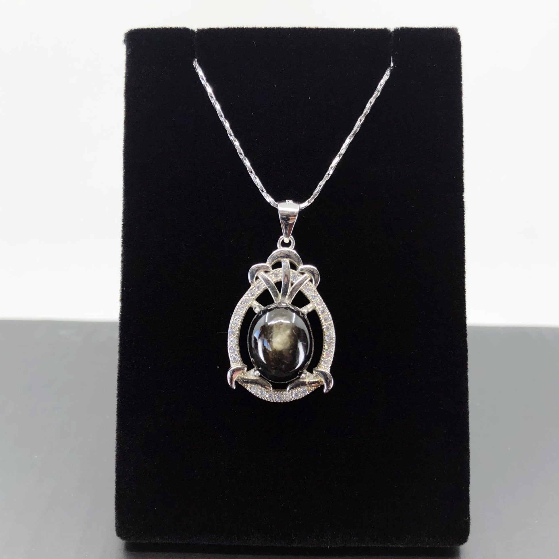 black star sapphire pendant necklace with a cubic zirconia halo with a 20" chain