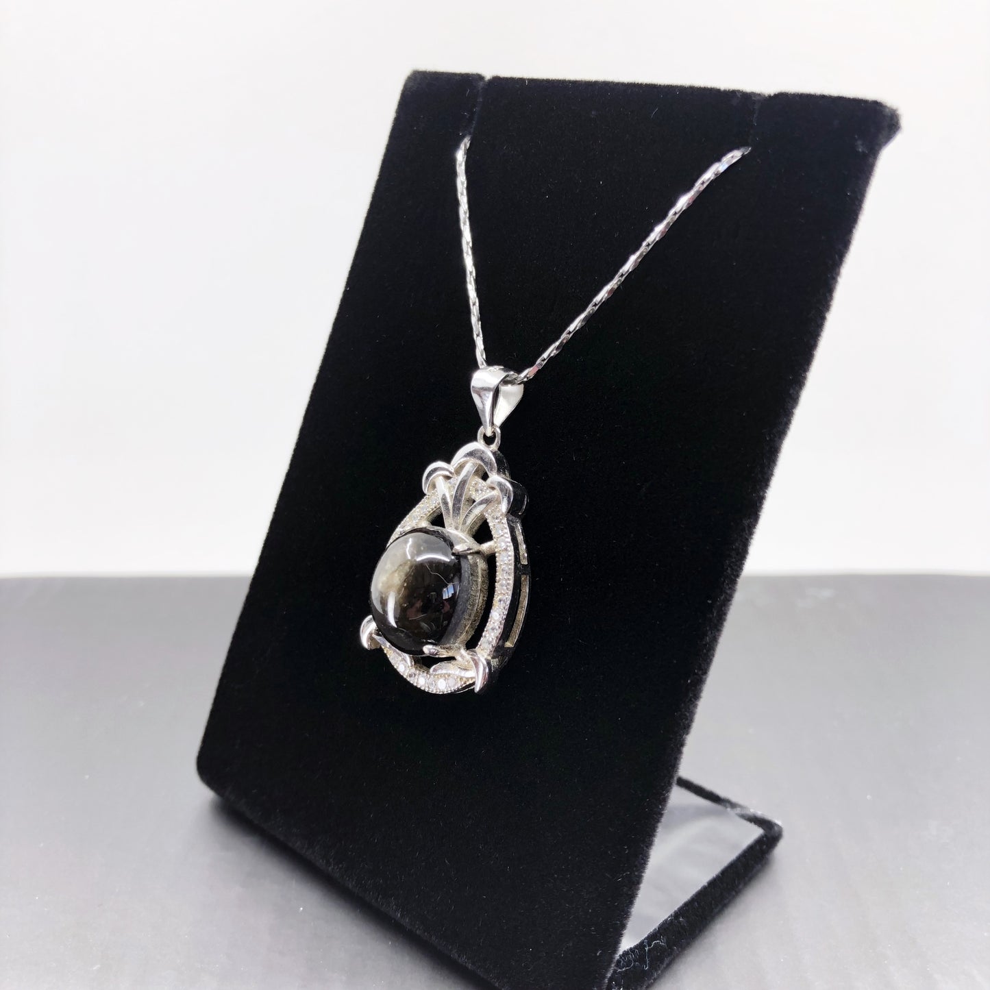 black star sapphire pendant necklace with a cubic zirconia halo with a 20" chain