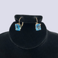 14K Yellow Gold Lever Back Earrings With Blue Topaz